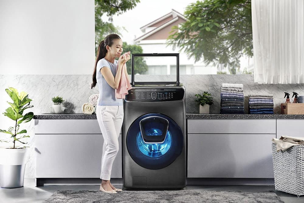 Máy giặt sấy là máy giặt có tích hợp chức năng sấy khô quần áo