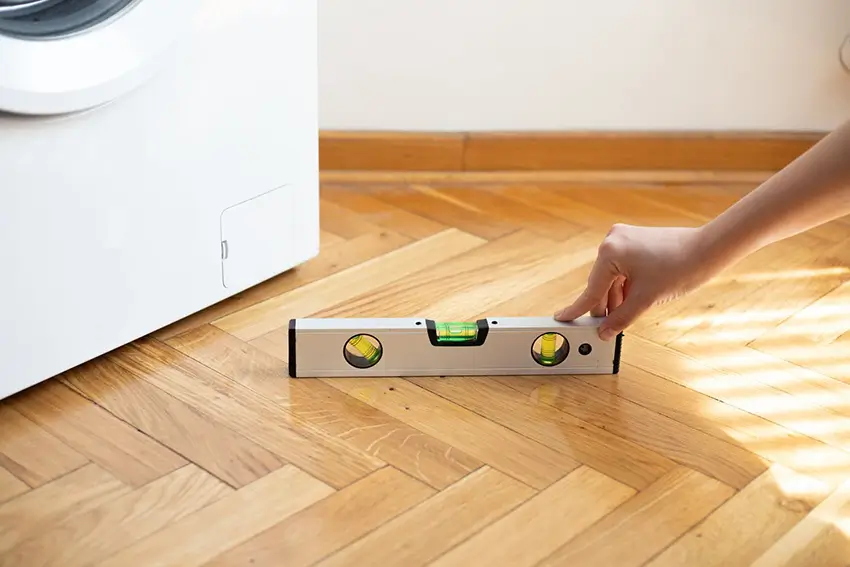 Máy giặt đặt không bằng phẳng gây lỗi UE máy giặt LG